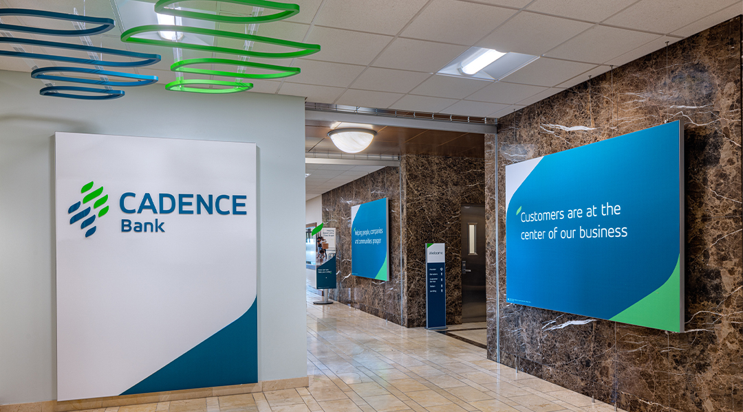 Architectural elements like waiting area halo and logo wall backdrop